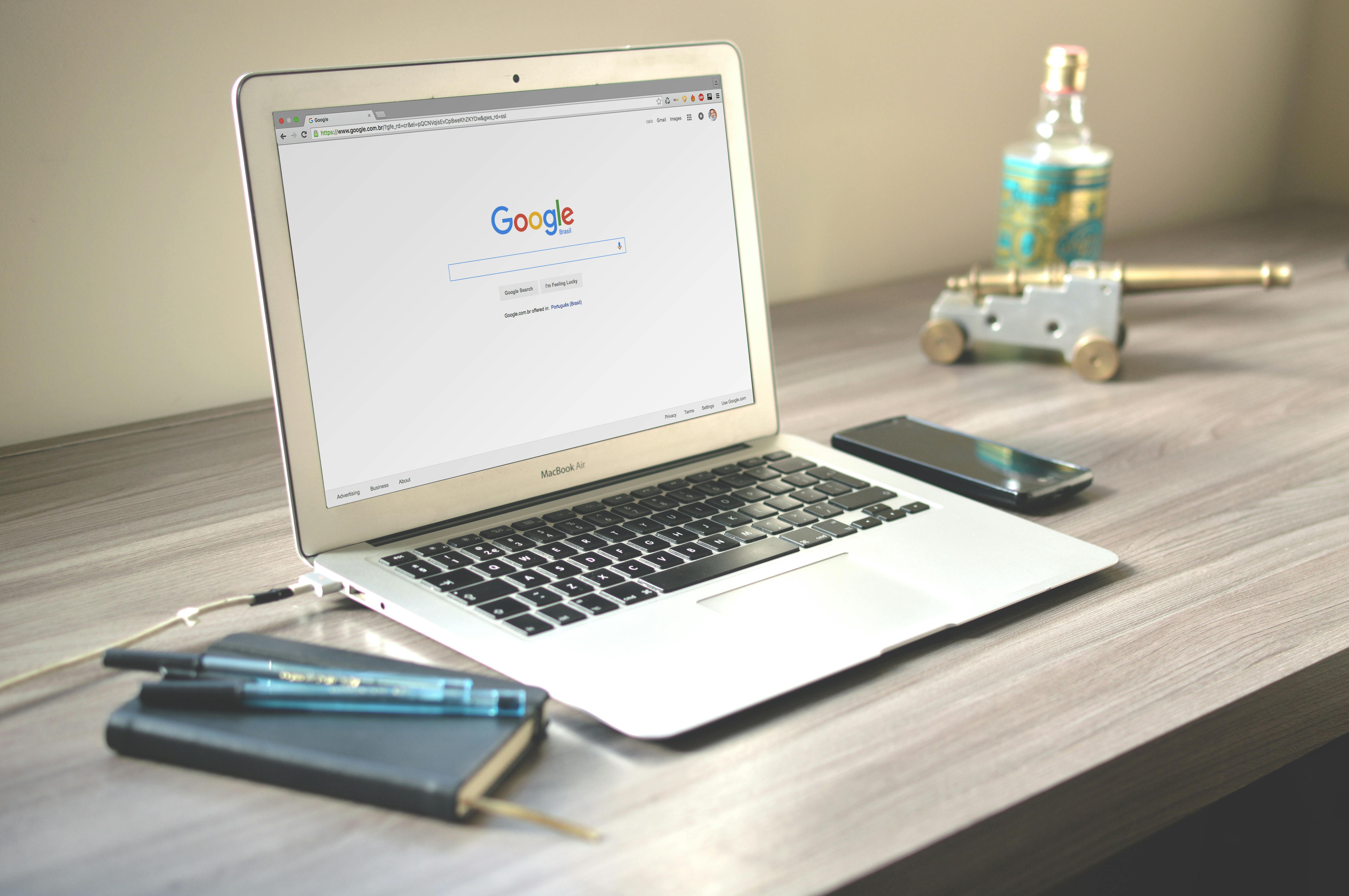 Laptop on desk with Google search engine results page